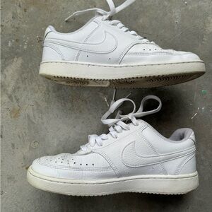 All white Nike court vision low sneakers